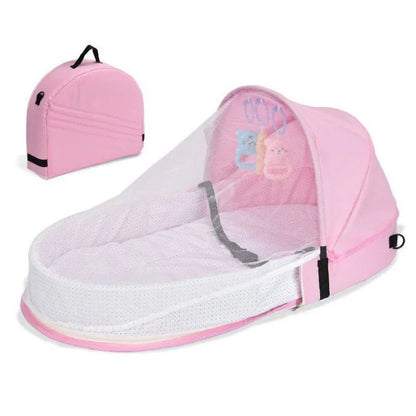 Reducteur de lit bébé portable avec moustiquaire intégrée