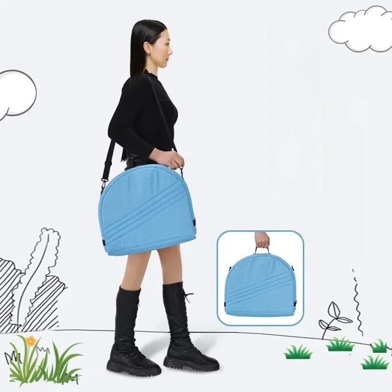 Reducteur de lit bébé bleu plié avec sac de transport