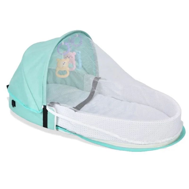 Reducteur de lit bébé vert avec moustiquaire respirante
