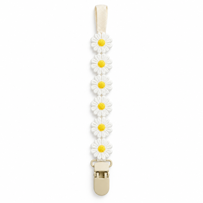 Attache blanche à six fleurs à cœur jaune, correction en cours