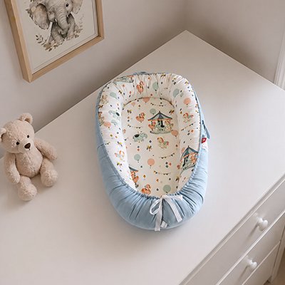 Reducteur de lit bébé sécurisant